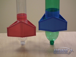 A close view of the adjustable box fin design on different bottles.