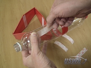 Apply the strips of velcro tape to each rocket the fins will be used on.