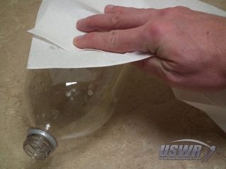 Dry the bottle with towels.