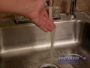 Carefully check to see that the water is not too hot to touch.