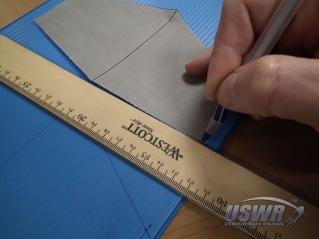 Trace the fin template onto the fin material.
