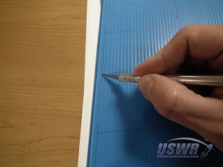 Cut the fins out using a hobby knife.