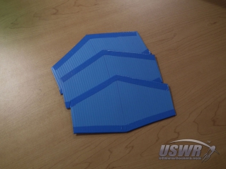All three fins with the leading and trailing edges taped.