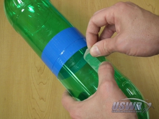 Apply the remaining strips of velcro tape to the body of the rocket.