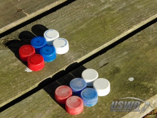 A collection of sanded (right) and unsanded (left) caps.