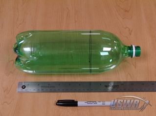 Mark a bottle approximately 7 inches from the bottom.