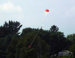 A modified version of the Hybrid Deploy Design is shown here on the FTC Water Rocket X-10 during a test flight.