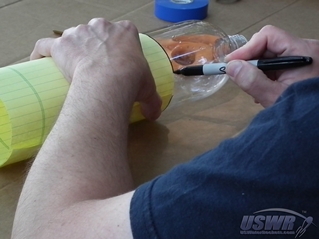 The Payload Compartment is made by marking a bottle and cutting the neck part off.