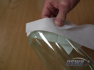 Wipe any sanding dust or debris from the sanded areas using a cloth or paper towels.