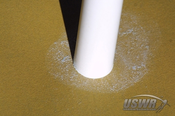 Sandpaper is used to clean up the pipe cutter and miter saw cuts.