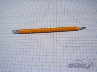 The wire is wrapped around the pencil as part of the hardening process.