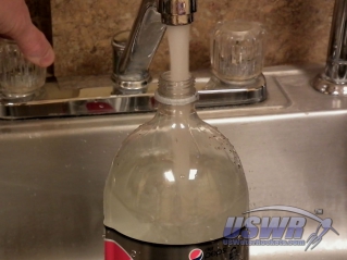 Stop filling when water level is above the label.