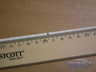 Measure the distance between the pen marks on the paper strip to get the circumference.