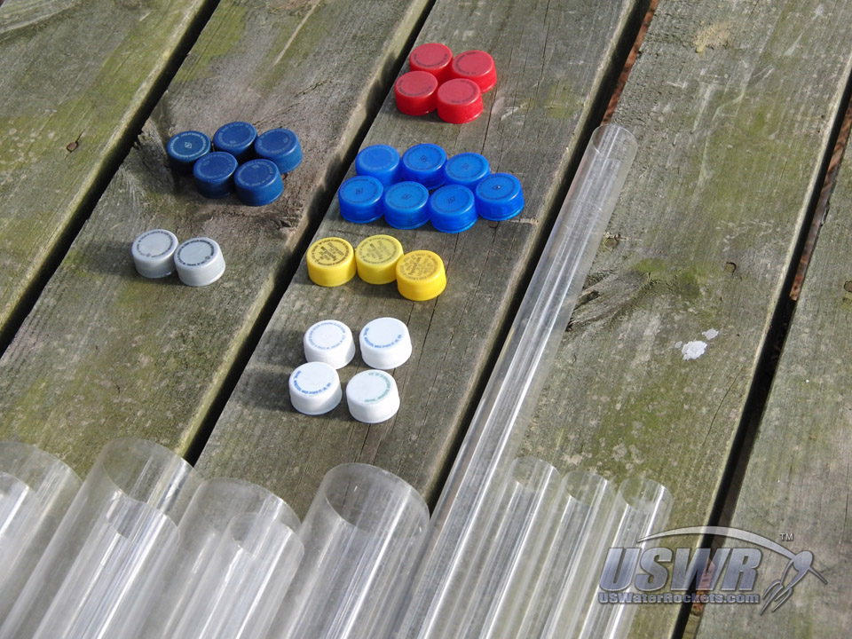 A collection of bottle caps and FTC tubes used to make couplers.