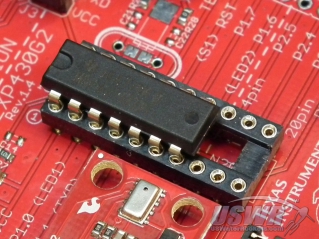 This is a 14-pin microcontroller. Notice that tjere are 6 empty holes below it in the chip socket. If you have a 14-pin chip, you need to add 2 wires to the Launchpad.