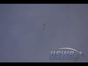 Rapid water rocket parachute deployment as seen from the ground.