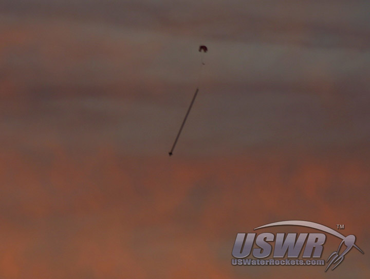 X-12 parachuting into the twilight.