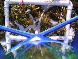 The jelly lens provides a nice view of the rocket nose and parachute as it touches down on the grass and snow.