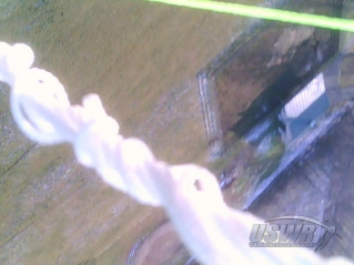Another onboard camera view showing the parachute shroud lines tangled as the rocket is going up.
