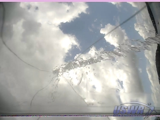 The final frame of good video from the chase camera shows the water column about to impact the camera. The lower pixels were captured just as the water impacted and they are distorted.