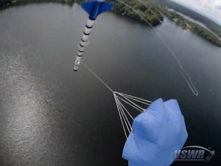 Chase Camera view of the Water Rocket Radial Parachute System deploying.